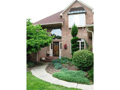 Grand Entry into two-story foyer. Natural light, open railing stairs, large cased openings into visible dining area from foyer. Center hall colonial in foyer passage interchange. Landscaped to 9's.