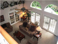Upper bed hall balcony overlook into formal living area.