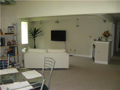 Family Room: Lower level walkout rooms read: fireplace/TV social area, recreation/play area, lower level kitchen, lower level laundry room, full bath, two beds, each with slider glass to walkout with lake view.

Family Room: Lower level walkout rooms read