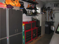 Yes, all you garage men junkies … there is a two-story home attached to this garage. Drywalled, insulated, sealed floor, full operators w remotes and keyless entry.