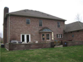 All brick means no maintenance and time for mega walled patio enjoyment. Open to s/e winter sun and s/w summer breeze, yet protected and buffered from n/w by garage appendage, walk out from family/kitchen area creates maximum livability.